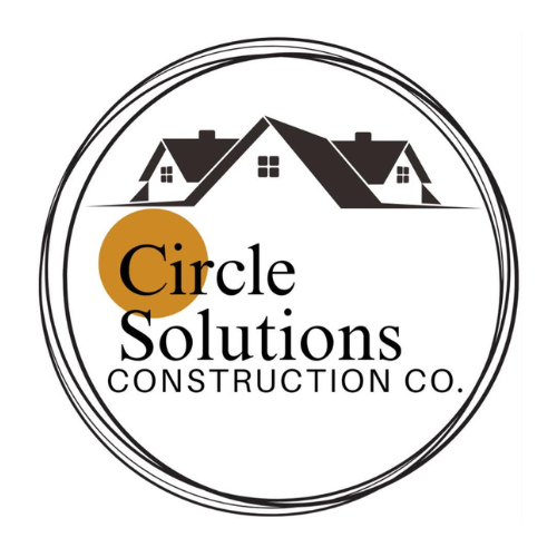 The logo for circle solutions construction co. is a circle with two houses on it.
