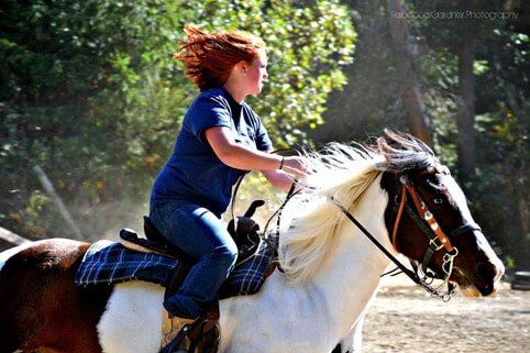 Girl in her horse riding lessons - horse riding lessons in Olalla, WA