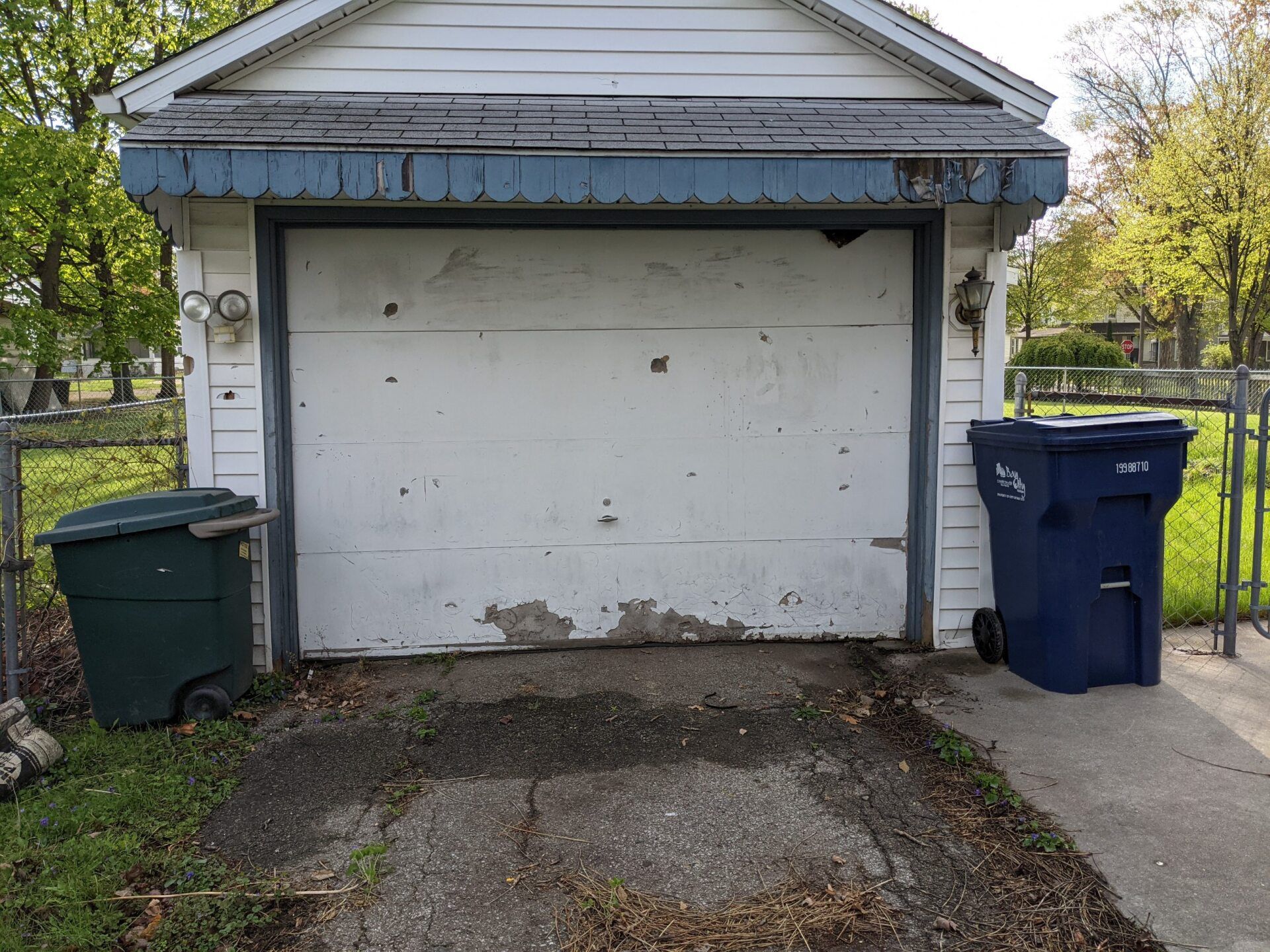 Before Garage White Door - Bay City, MI - M & R Garage Doors & Openers