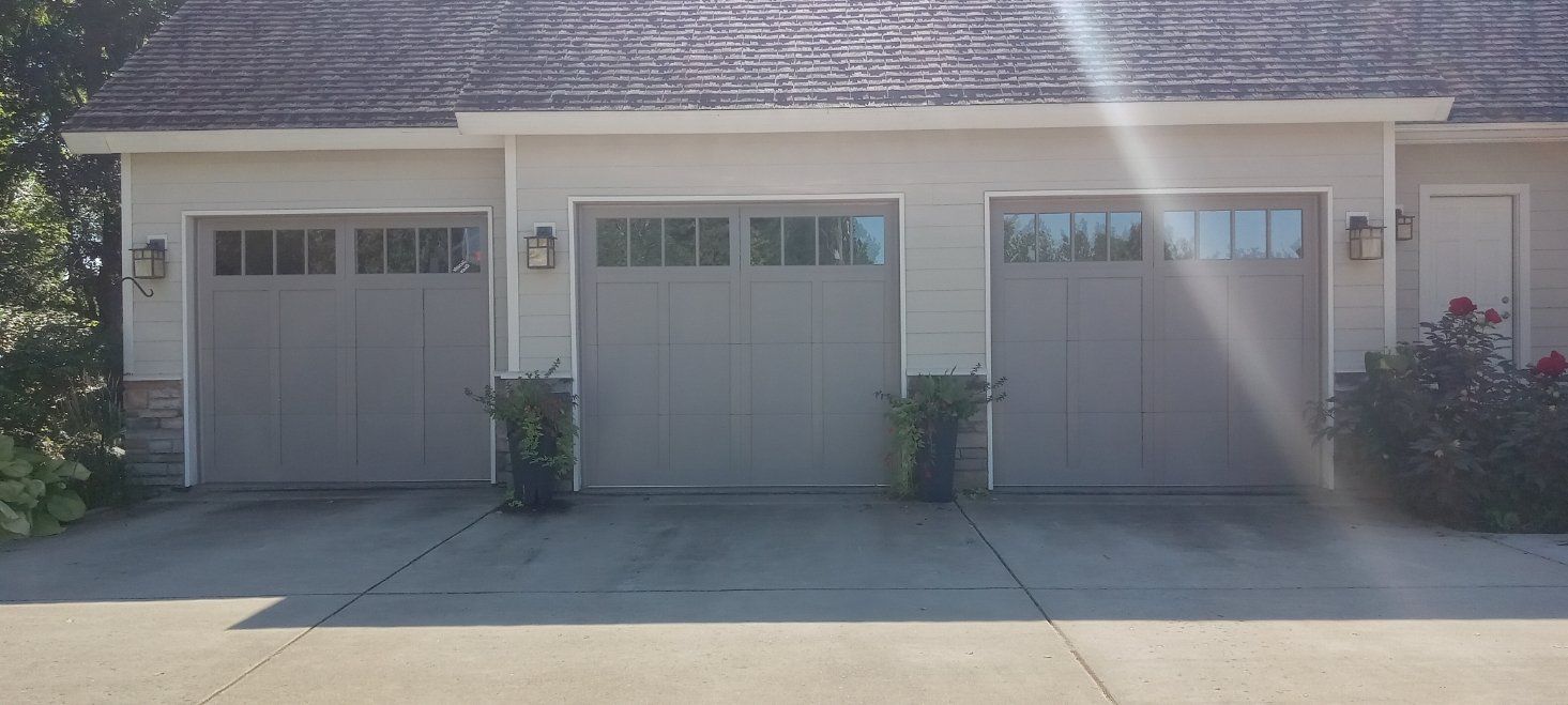 Three Garage Door Installed- Bay City, MI - M & R Garage Doors & Openers