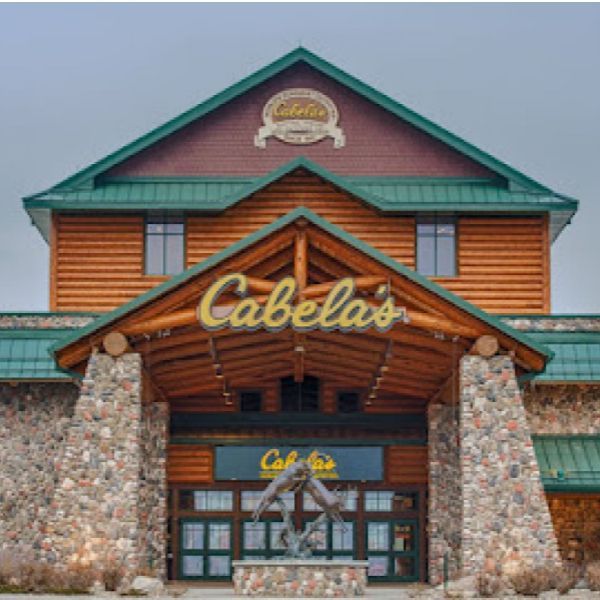 A large building with a sign that says cabela 's