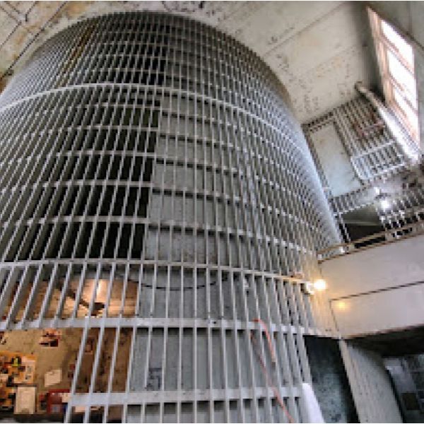 A very tall building with a lot of bars on it