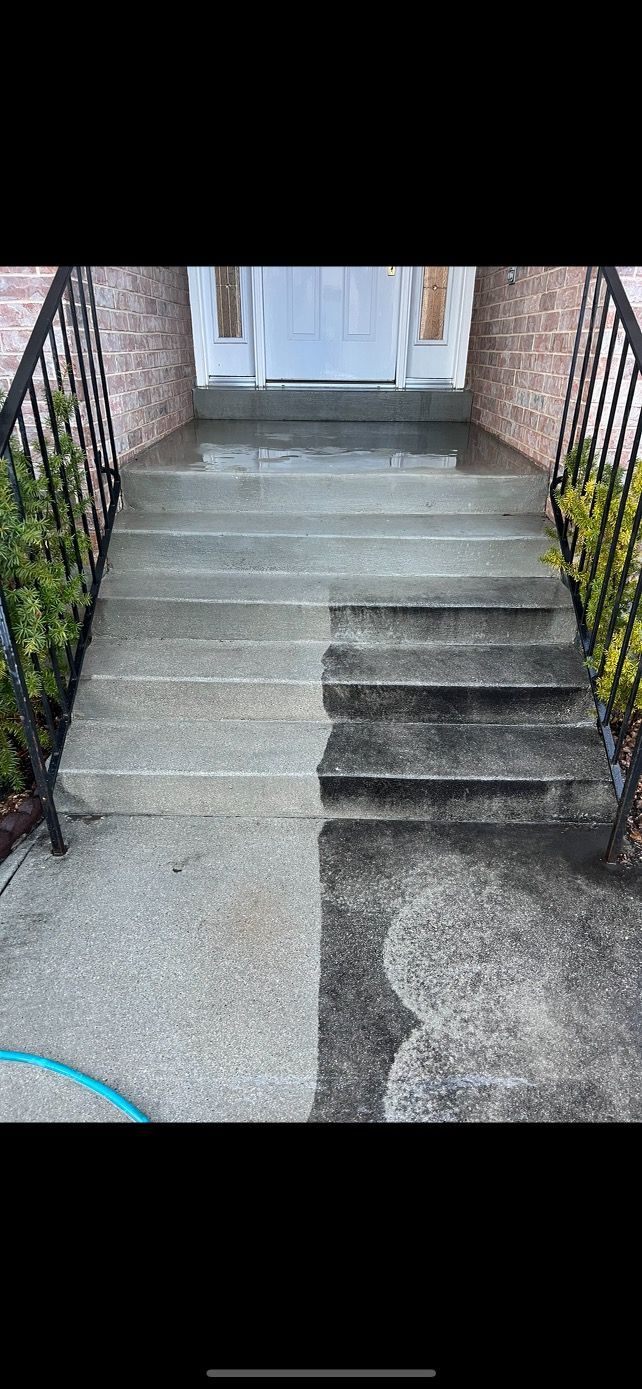 Concrete steps are shown, split in half. The left side is clean and light gray, while the right side is dark and dirty. Black railings run along both sides.