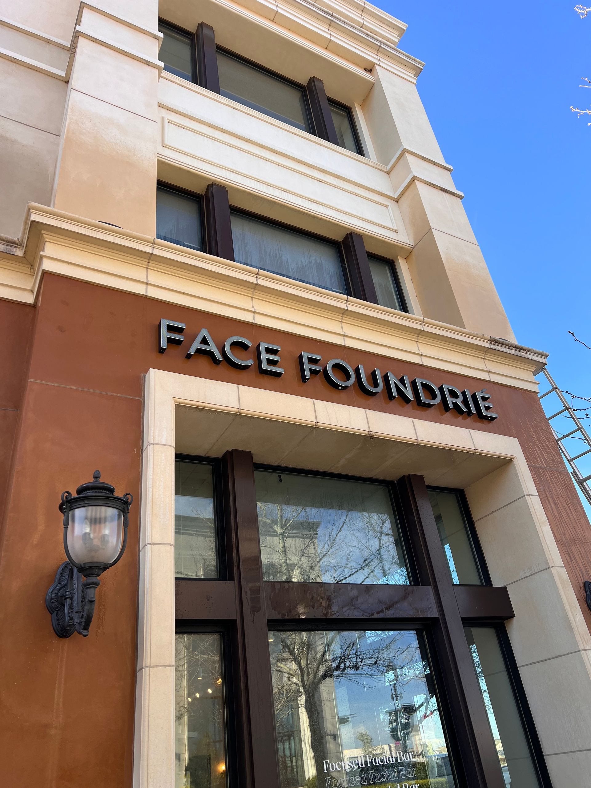 Exterior of a building with a sign reading