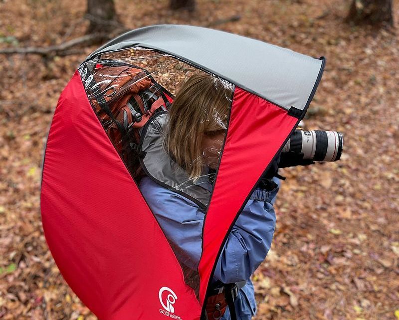 Woman in nature wearing the GOShelter Photo Black