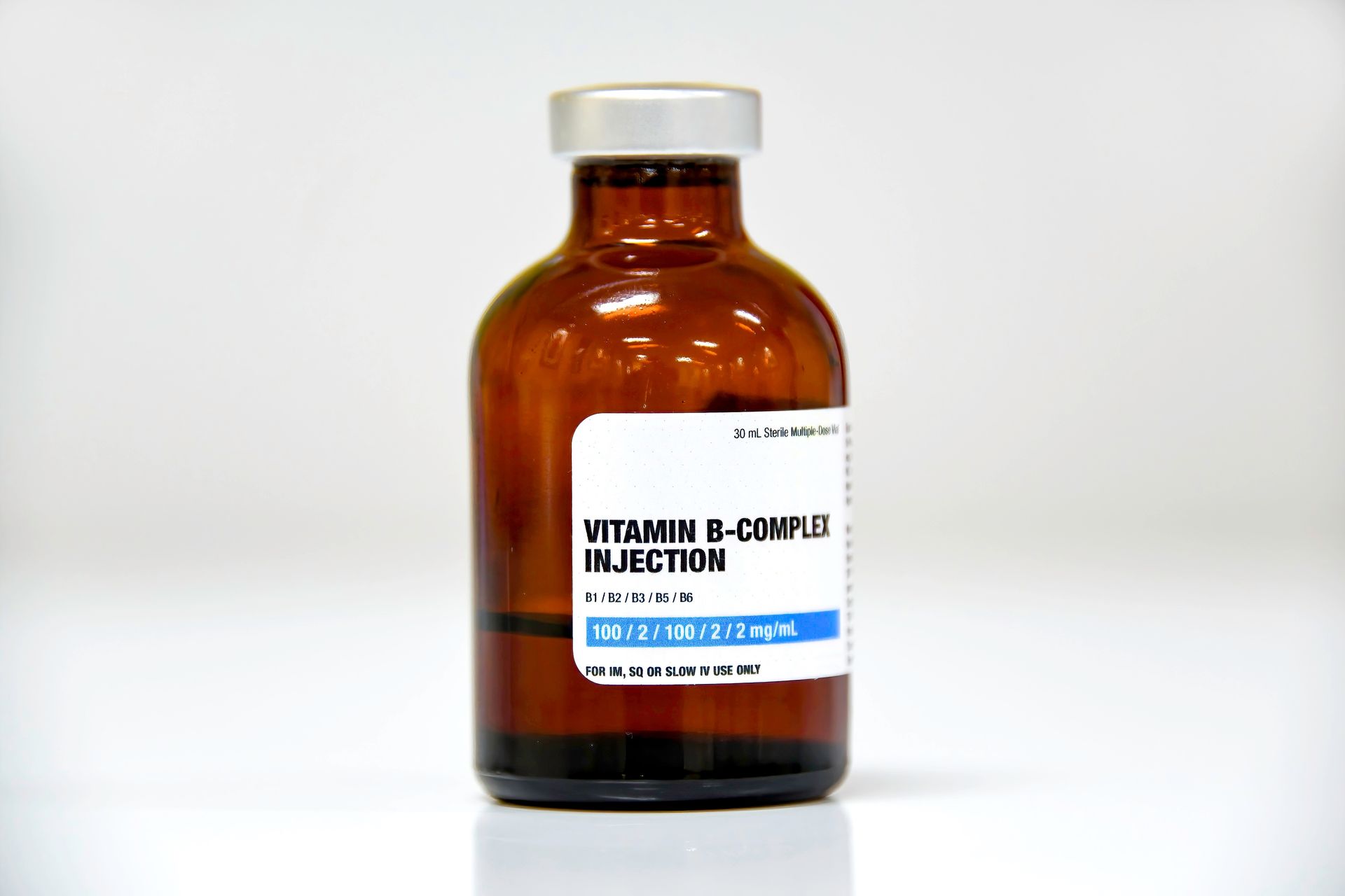 A brown bottle of vitamin b complex injection