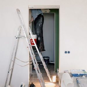 Man doing house interior restoration