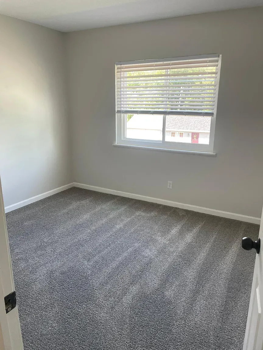 There is a large window in the middle of the room.