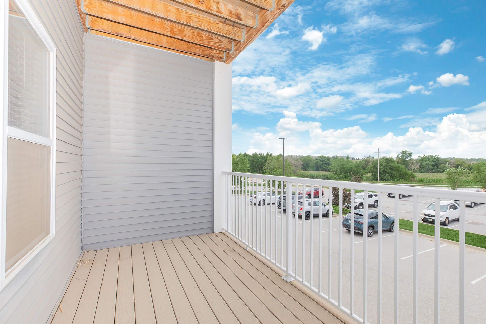 Spacious balcony at The Grove on Devils Glen apartments in Bettendorf, IA