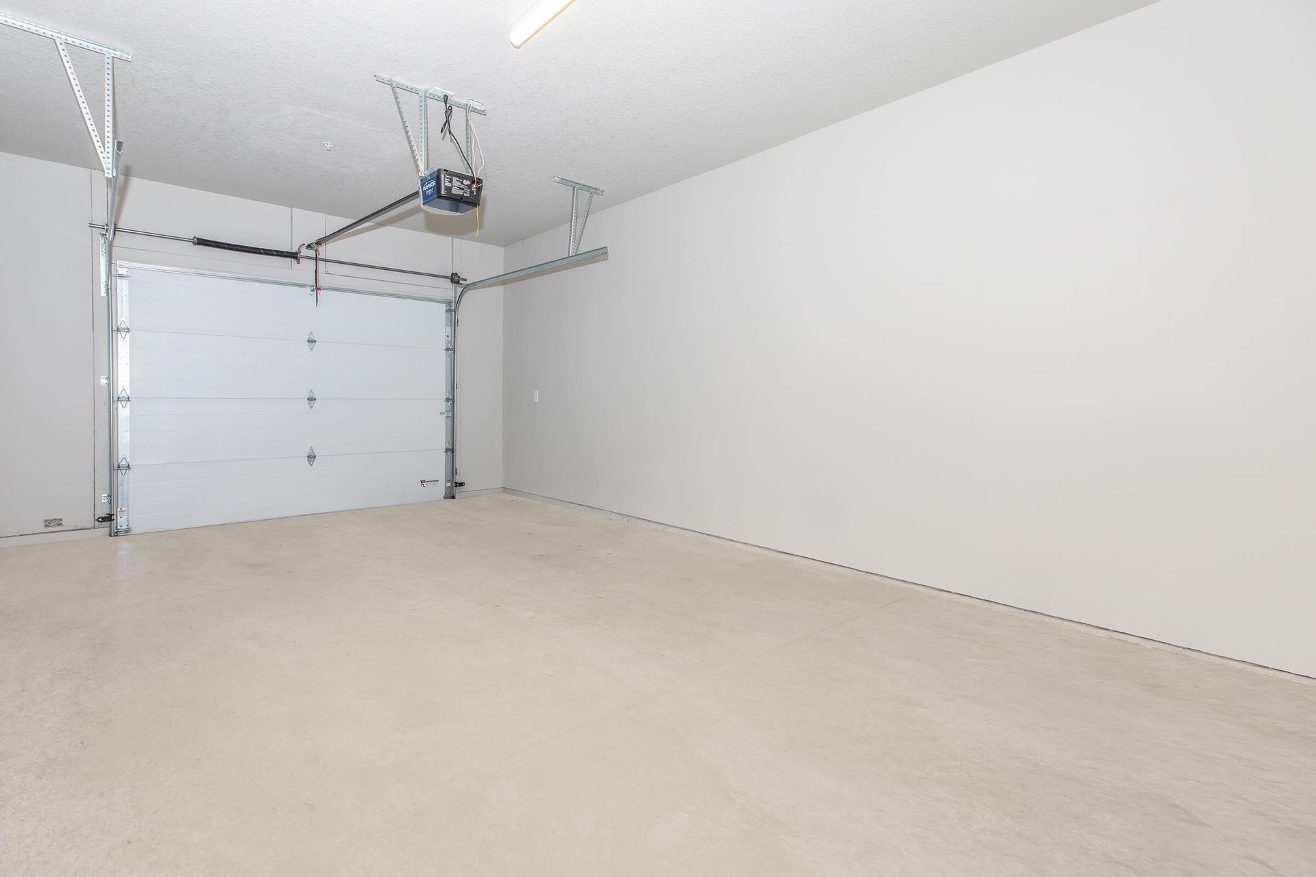 Attached and detached garages at The Grove on Devils Glen apartments in Bettendorf, IA