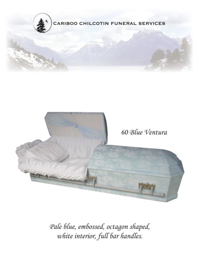 Casket with white satin interior on a funeral services advertisement with mountain backdrop.
