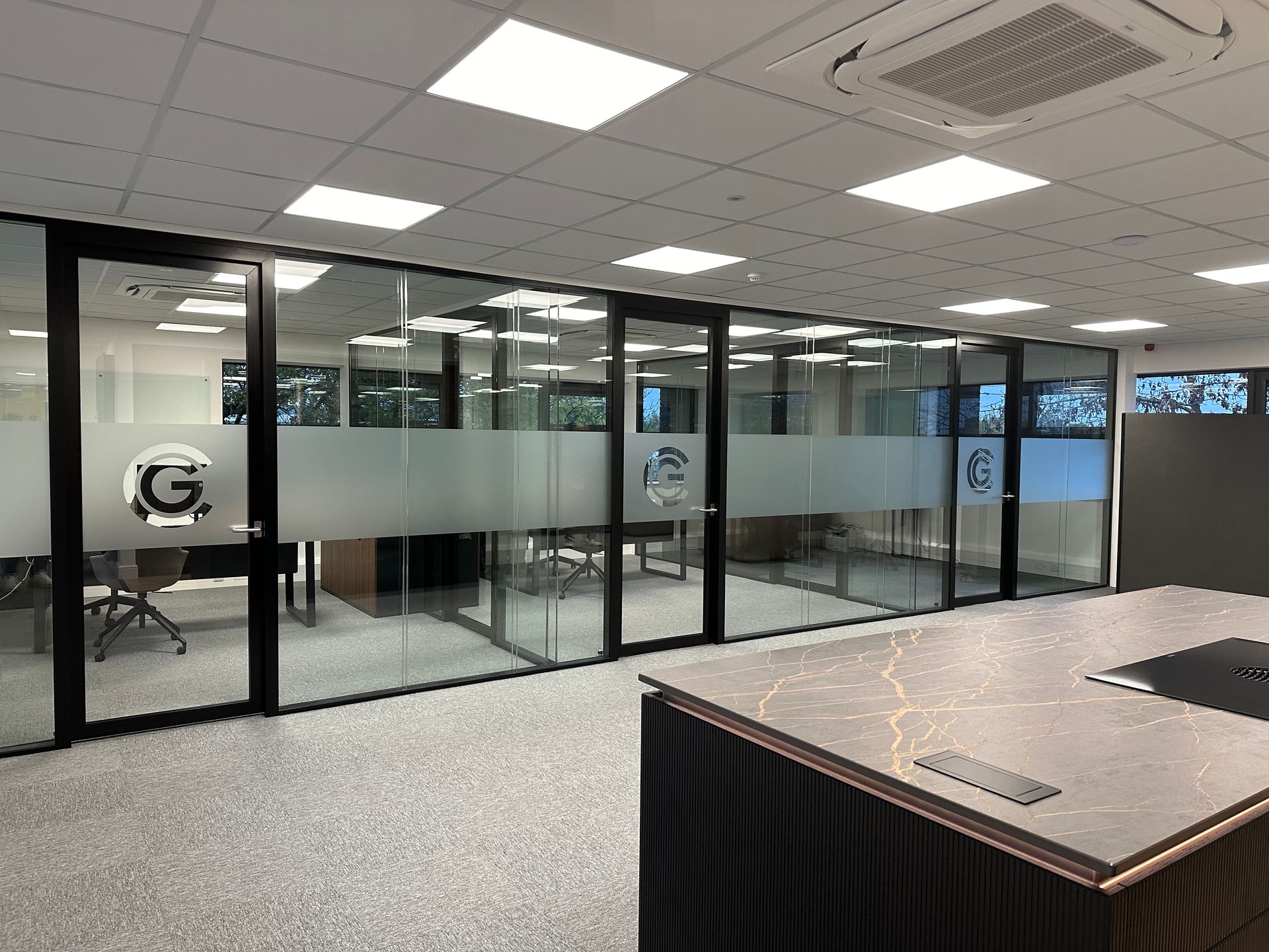 Glass Offices with frosted manifestation