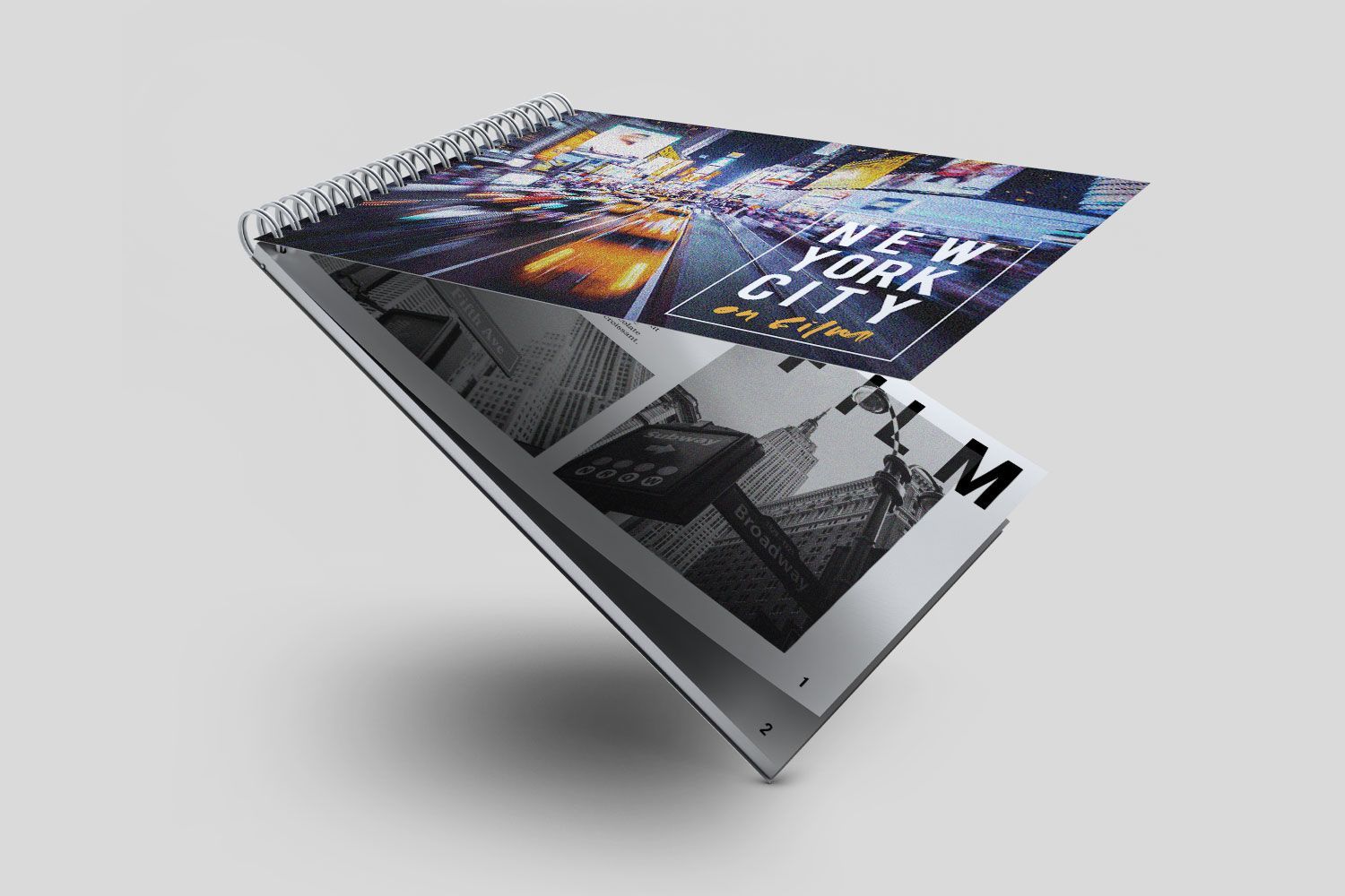 A spiral bound book with a picture of new york city on it.
