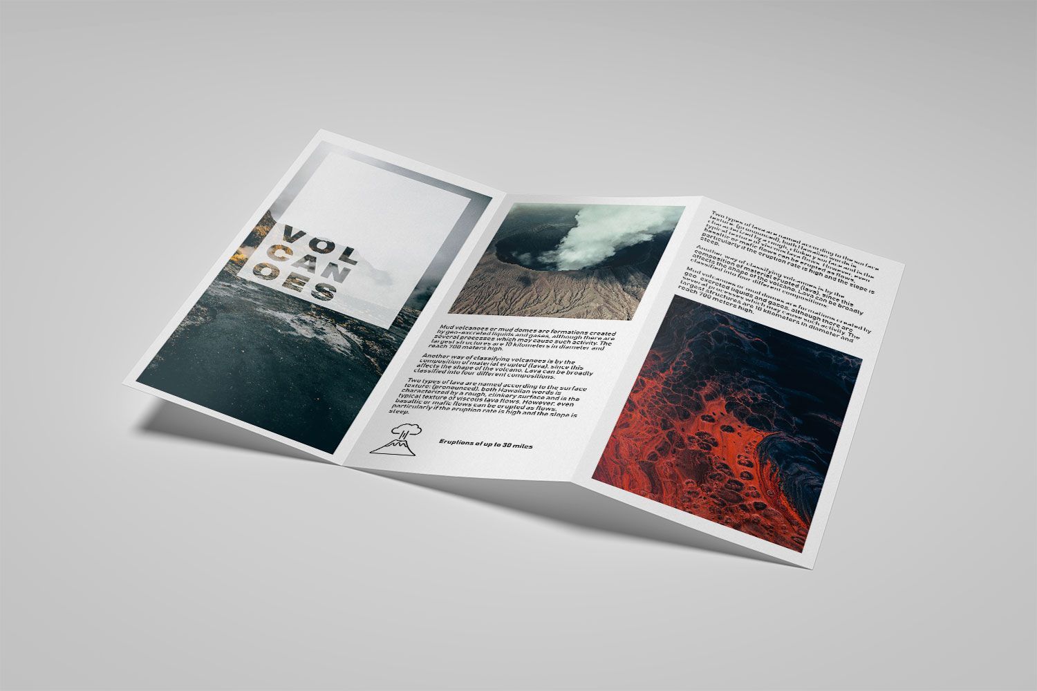 A folded brochure is sitting on a white surface.