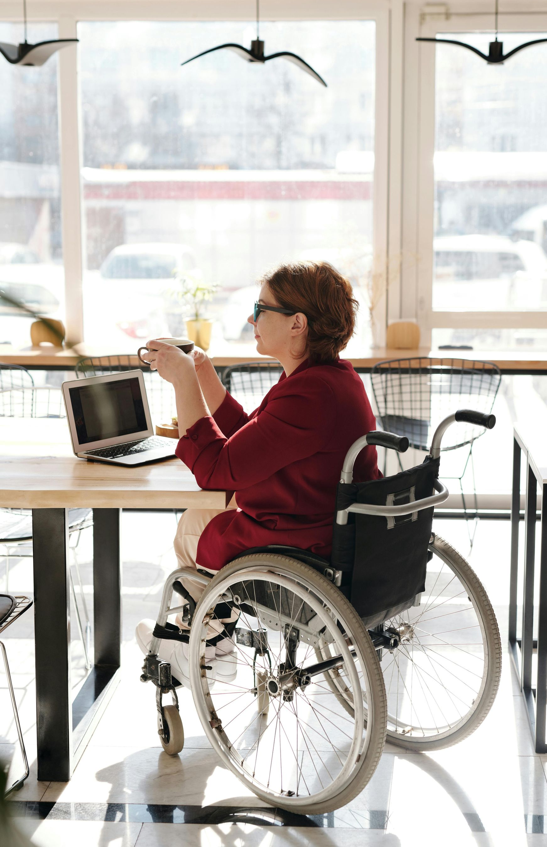 blind woman in wheel chair using a computer