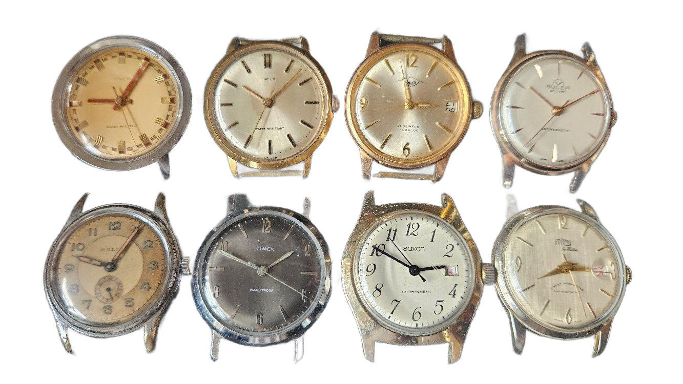 Eight vintage wristwatches with various watch faces and metal bands, arranged in two rows.