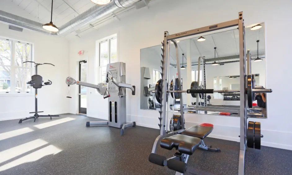 Modern gym equipped with fitness machines and weights. At Waxhaw Mills, our apartments for rent in Waxhaw, NC offer the best in service and enviable amenities. Experience all our community has to offer. Contact us to set up a tour!
