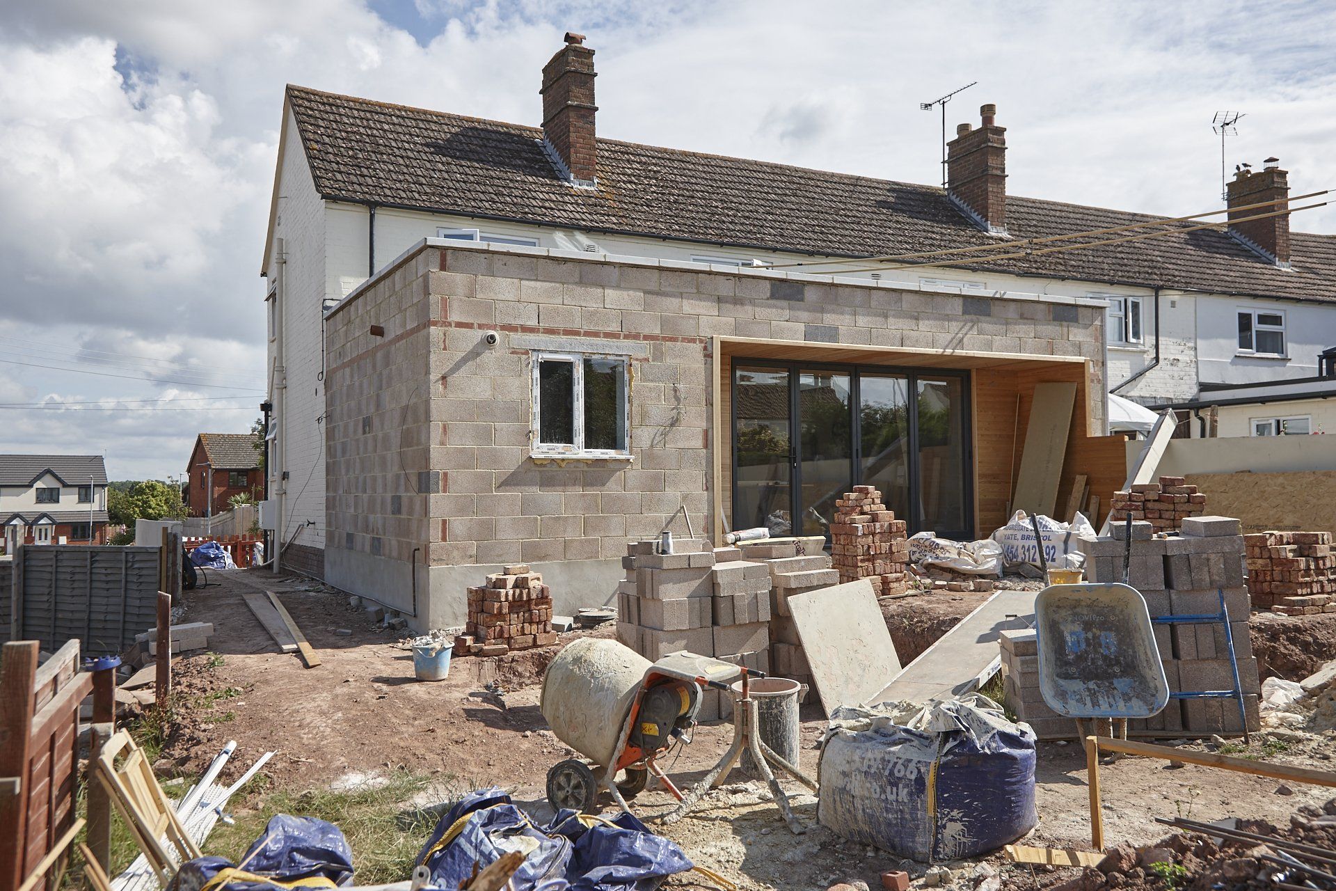 A house is being built in a residential area.
