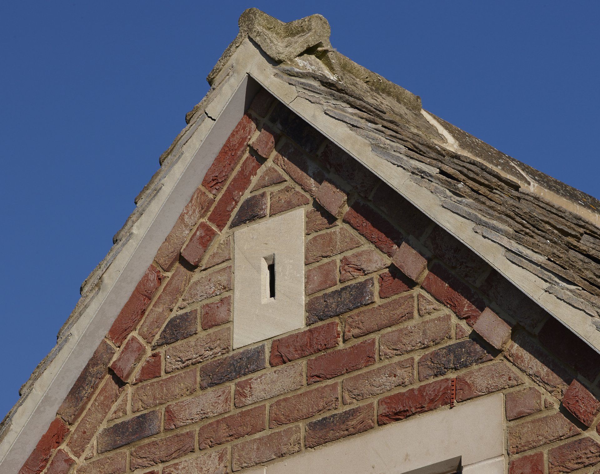 A brick building with the number 1 on it