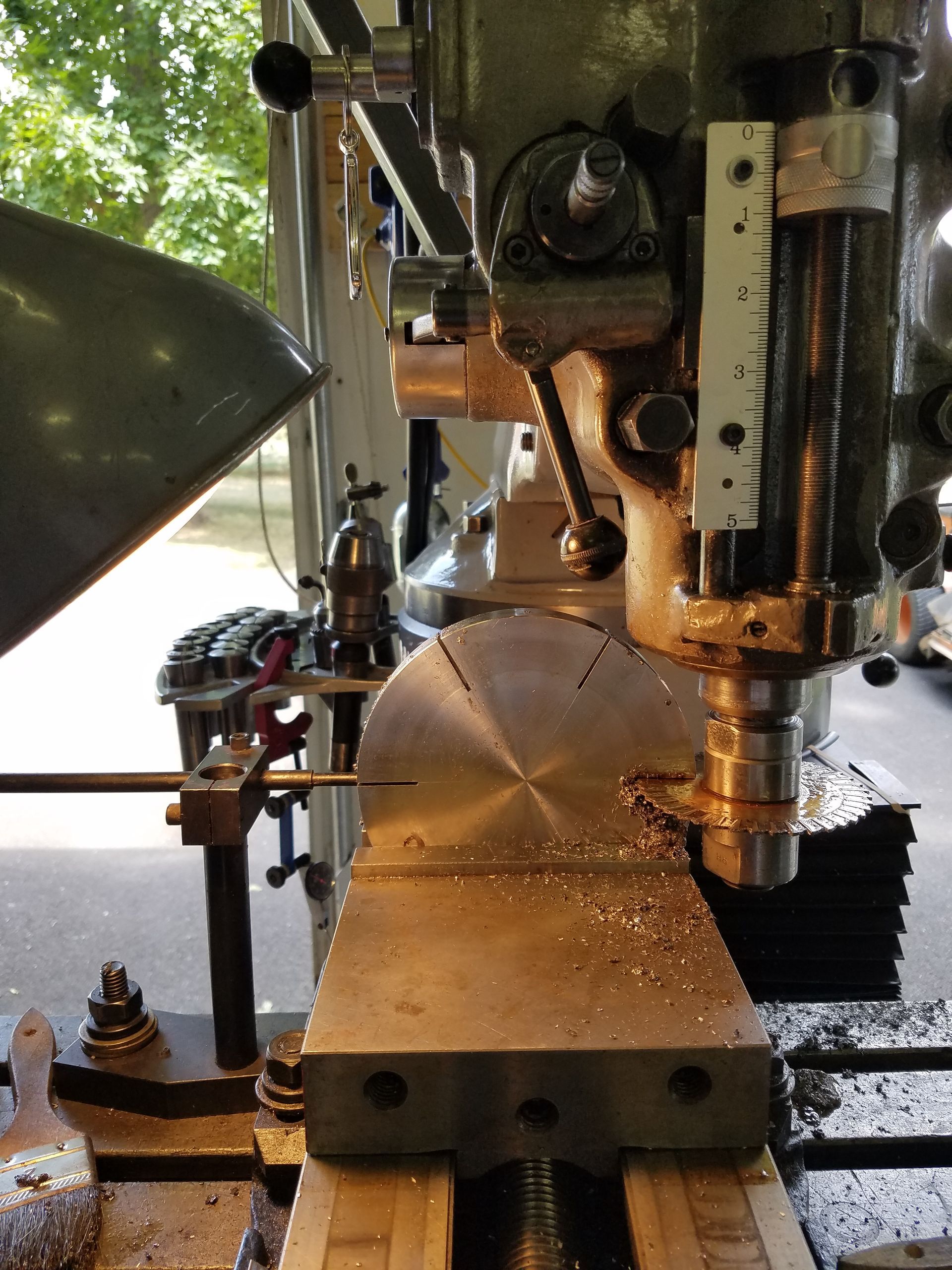 A machine is being used to cut a piece of metal