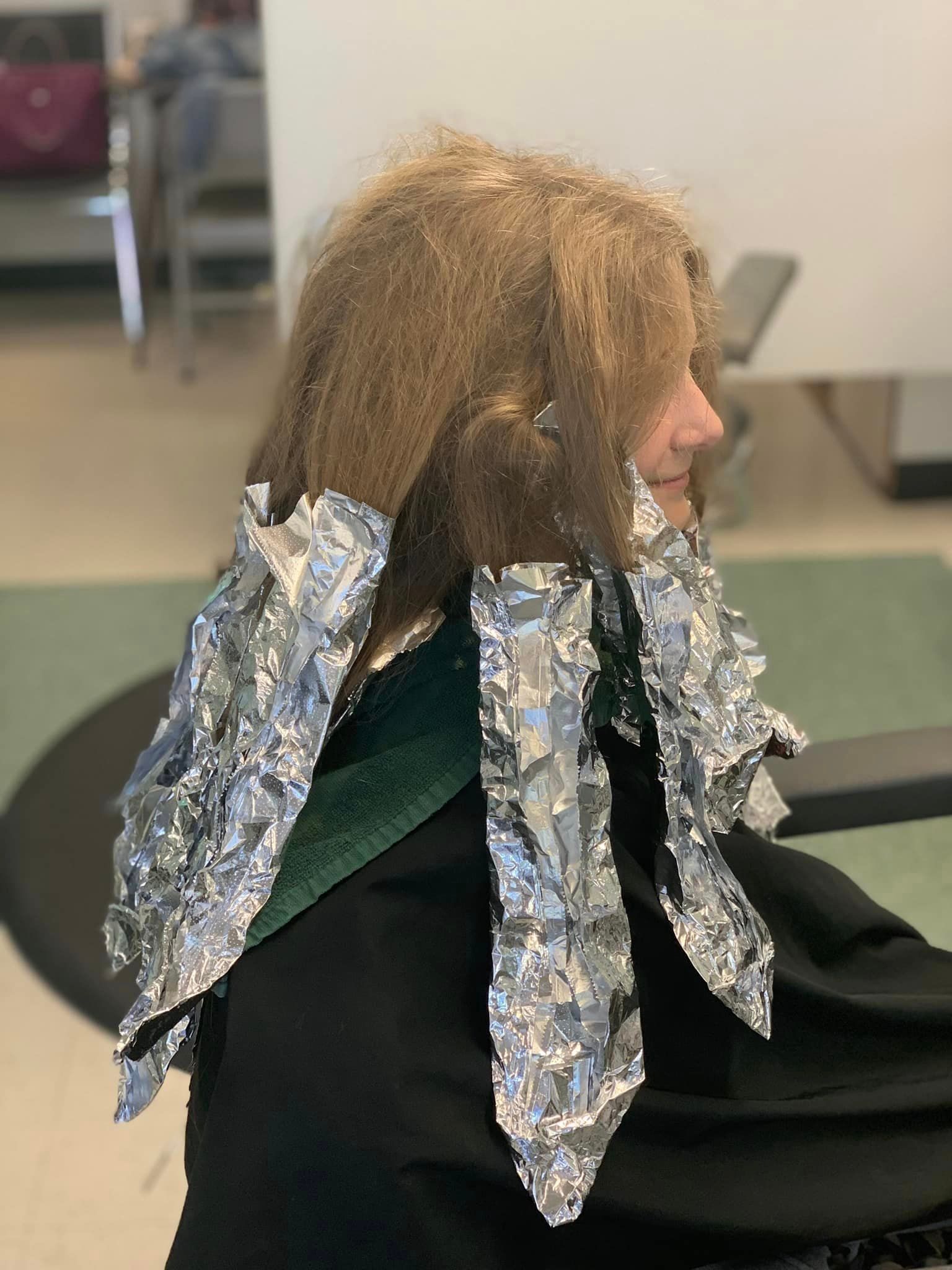Little girl hair covered with foil — Grandville, MI — Ultra Hair