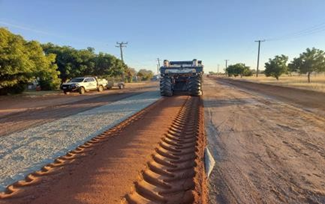 Road Stabilisation Machinery Working on a Sealed Road Project — Lamont Civil Services Pty Ltd In Townview, QLD