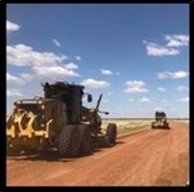 Heavy Machinery Repairing Flood-Damaged Road — Lamont Civil Services Pty Ltd In Townview, QLD