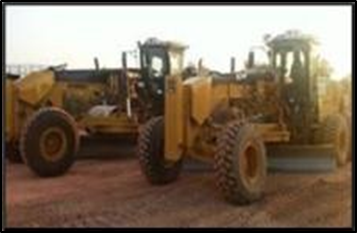 Two Large Yellow Motor Graders Are Parked Side-By-Side on A Dirt Construction Site — Lamont Civil Services Pty Ltd In Townview, QLD