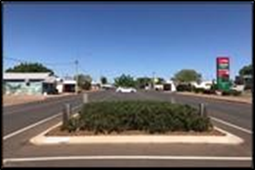 A View of A Small Town with A Roundabout Featuring a Patch of Bushes — Lamont Civil Services Pty Ltd In Townview, QLD