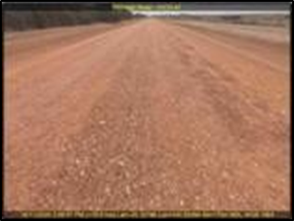 Unsealed Red Dirt Road Under Repair for Flood Damage — Lamont Civil Services Pty Ltd In Townview, QLD