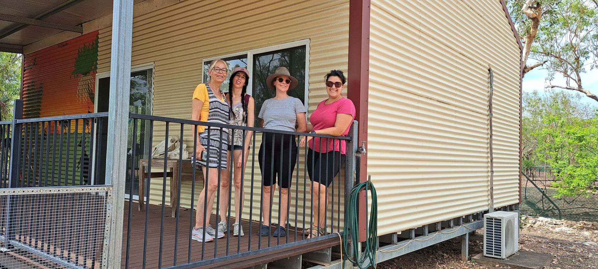 Four Woman Standing On The Veranda Outside The Clinic 