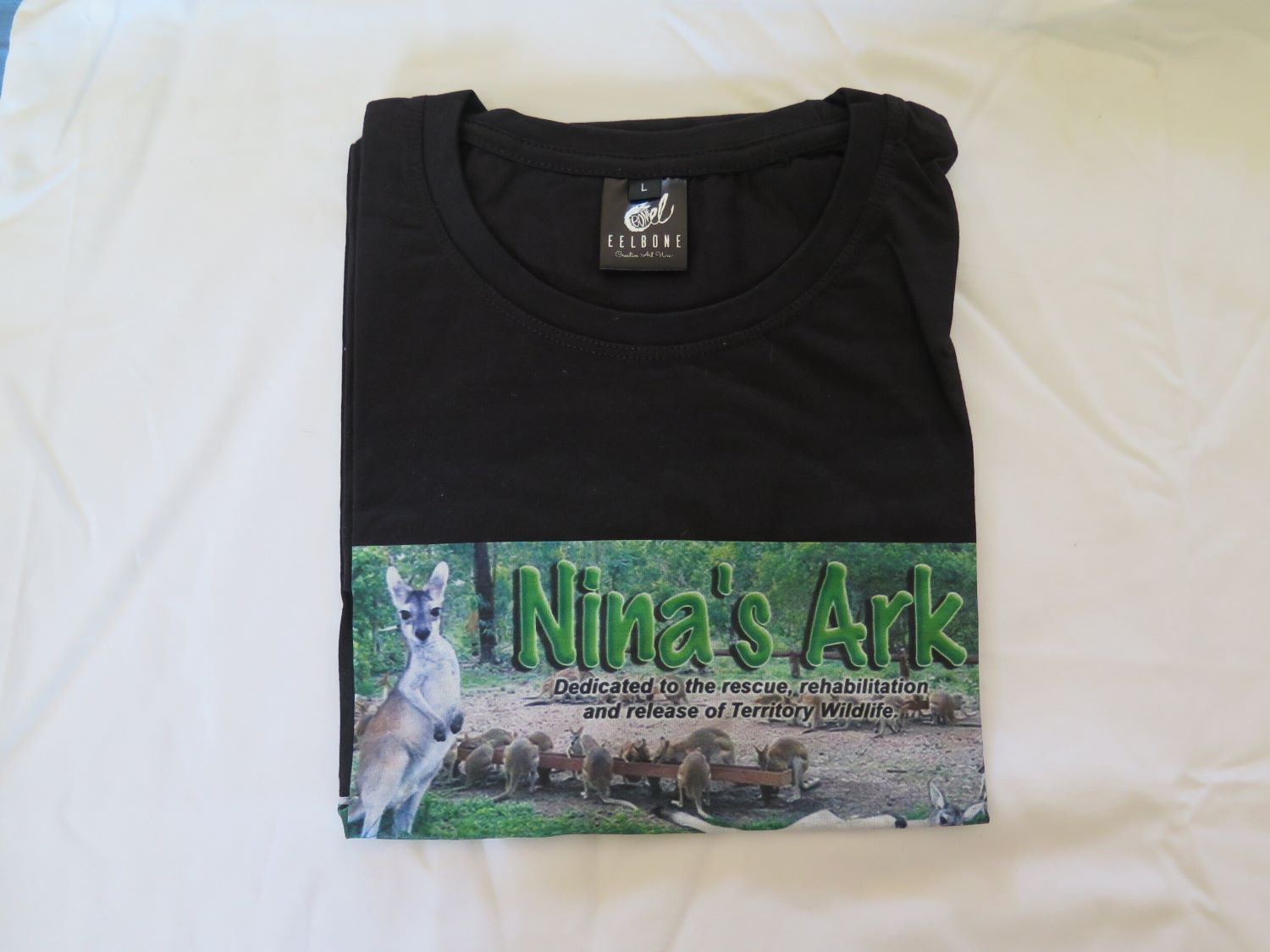 A Black T-shirt That Says Niva 's Ark on It — Nina's Ark Wildlife Sanctuary In Finniss Valley, NT