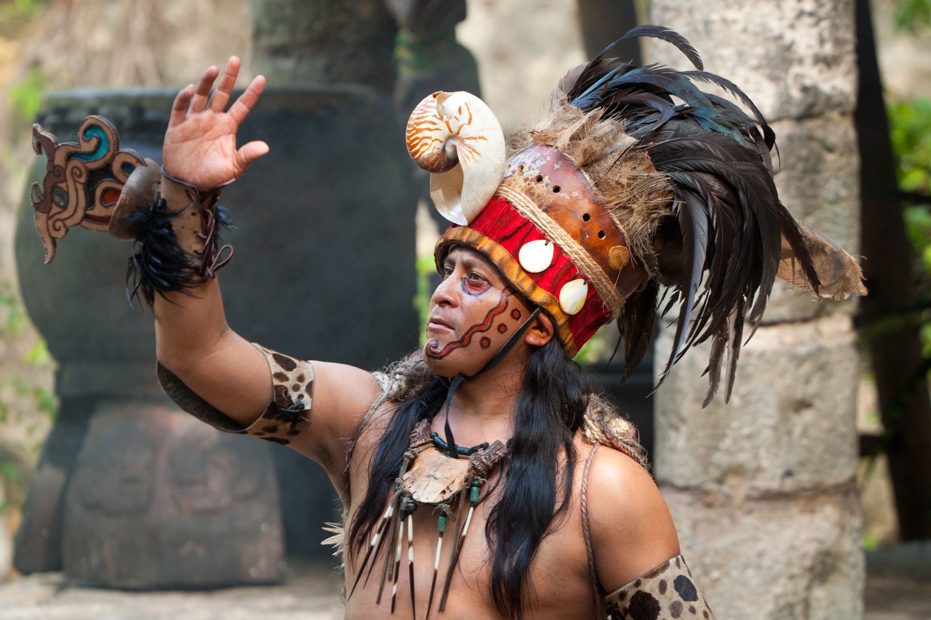 Indigenous dancer performing in traditional costume — ancient heritage and rituals of Mexico.