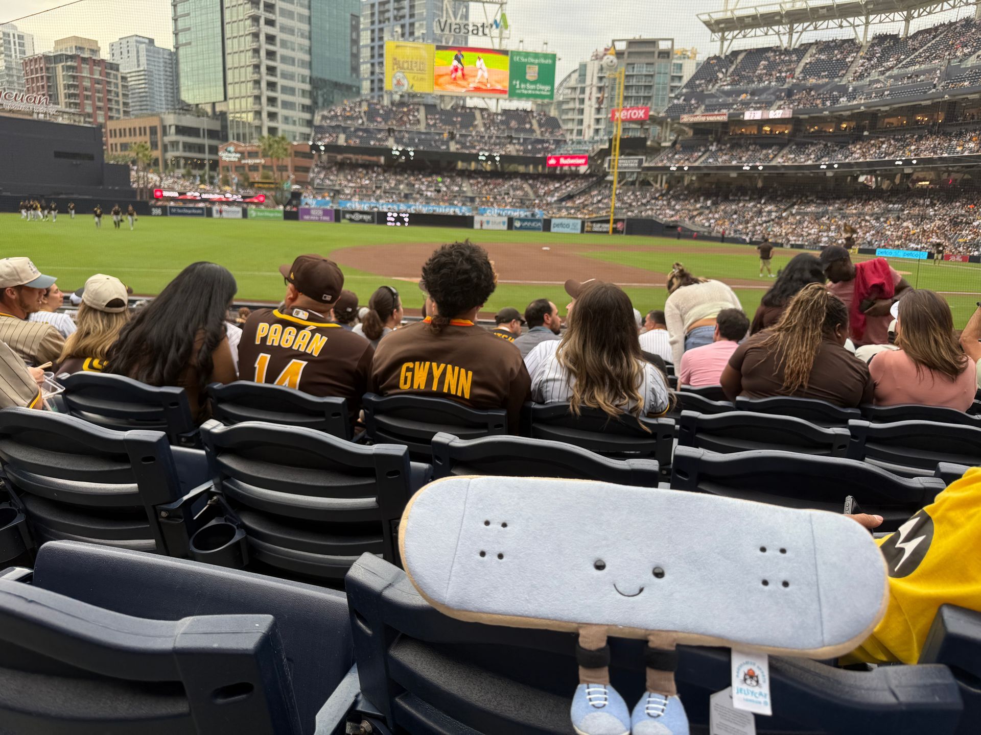 Flip the plush skateboard at a Major League Baseball game
