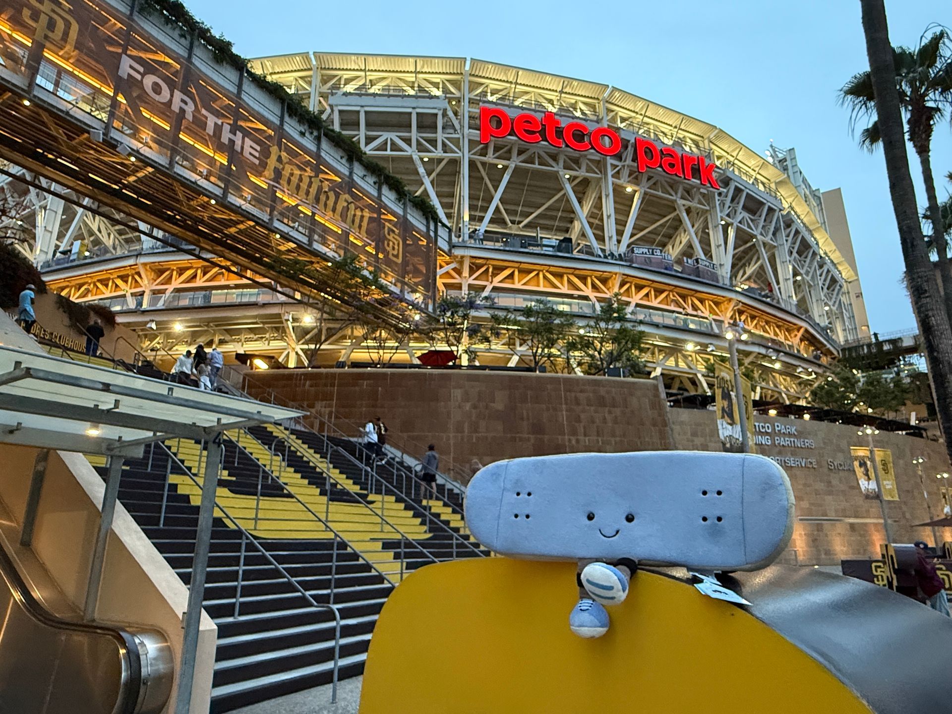 Flip the Latitude Buddies plush skateboard mascot outside Petco Park in San Diego before a family-friendly baseball game