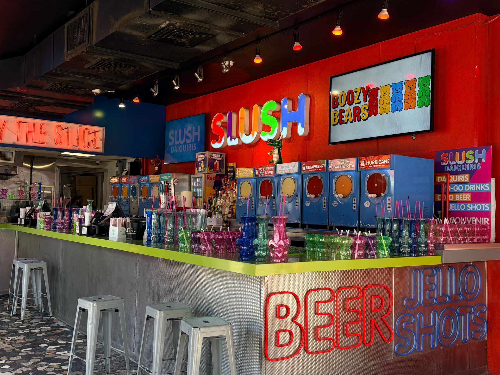 Colorful frozen daiquiri bar in New Orleans serving classic Louisiana frozen cocktails in the heart