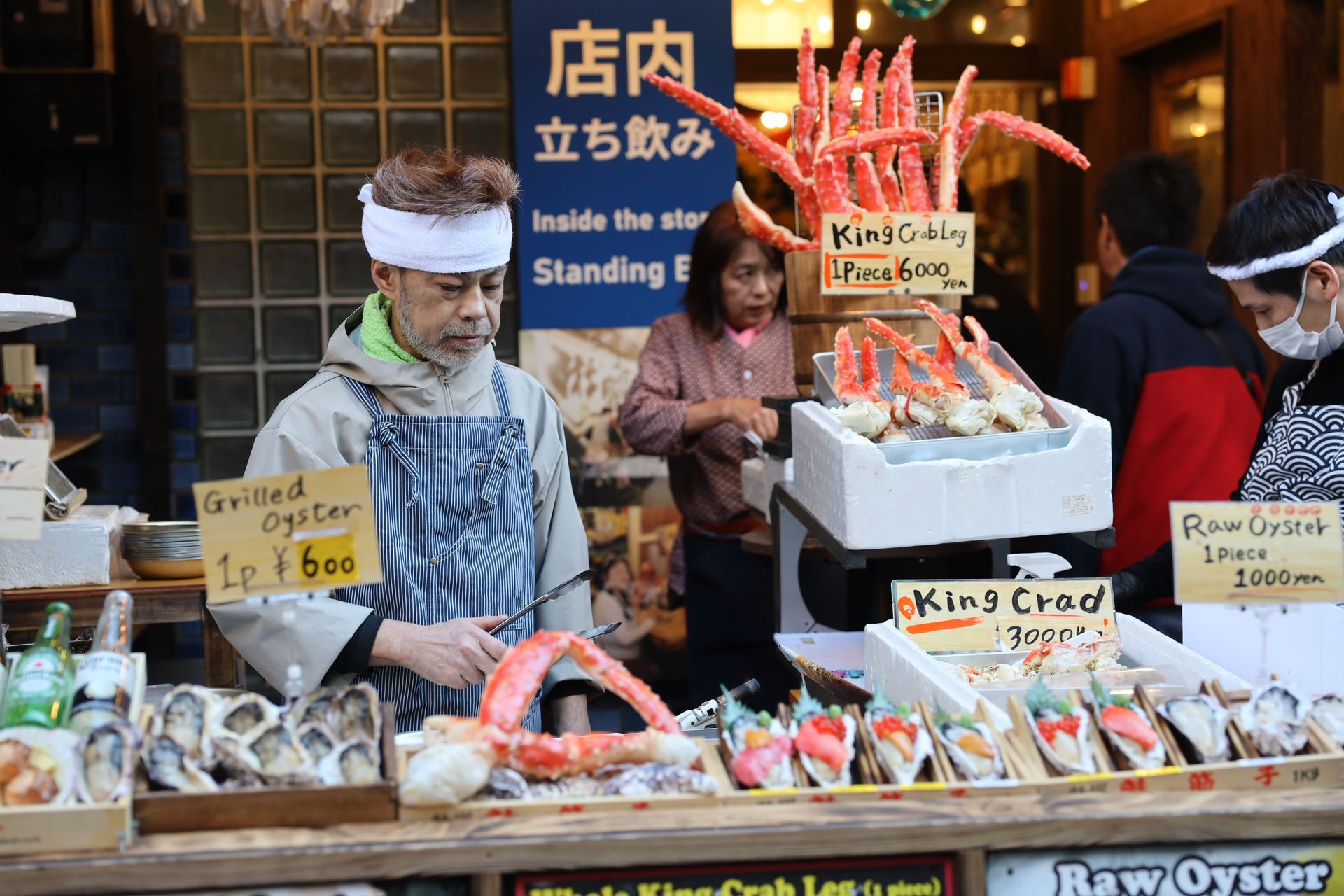 Tsukiji Outer Market in Tokyo with fresh seafood stalls and street food vendors