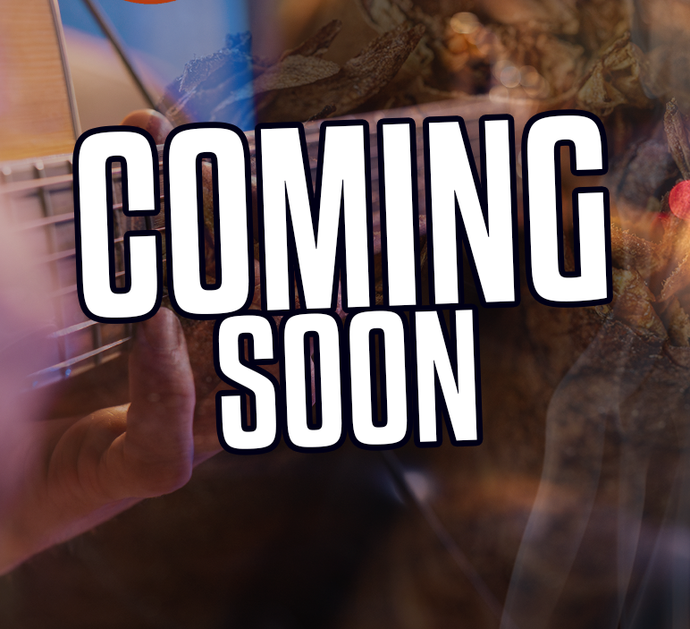 Basketball player in white and blue uniform with the number 15 dribbling the ball on a wooden court.