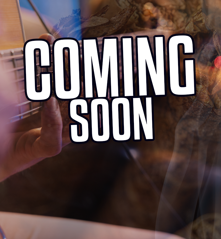 Basketball player in white and blue uniform with the number 15 dribbling the ball on a wooden court.