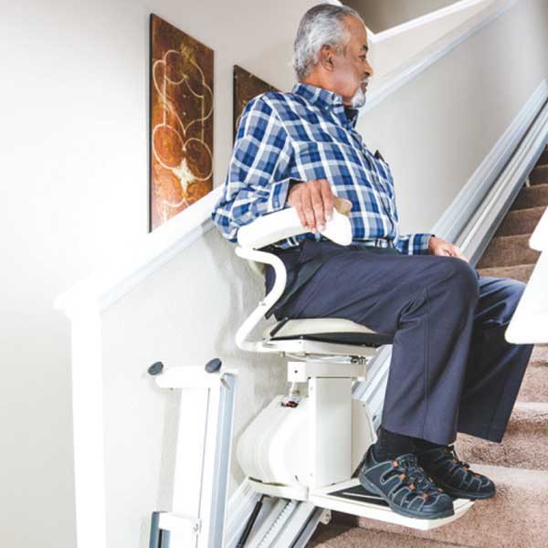 Old Man Enjoys Using His Harmar Indoor Stair Lifts