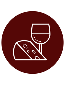 A slice of cheese and a glass of wine in a circle.