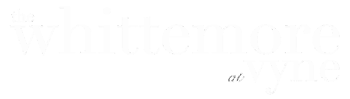 A white background with a few small dots on it.