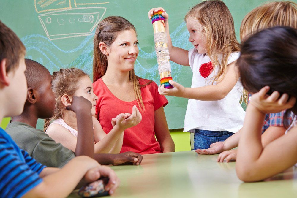 Children in musical education with teacher — Diploma of Early Childhood Education & Care in Queensland in Kingaroy, QLD