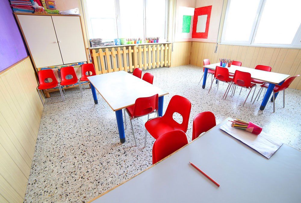 inside a classroom with desks and red chairs — Diploma of Early Childhood Education & Care in Queensland in Kingaroy, QLD