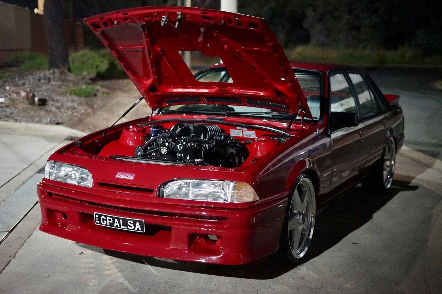 Red Car with Open Hood — Trusted Car Mechanic in Canberra