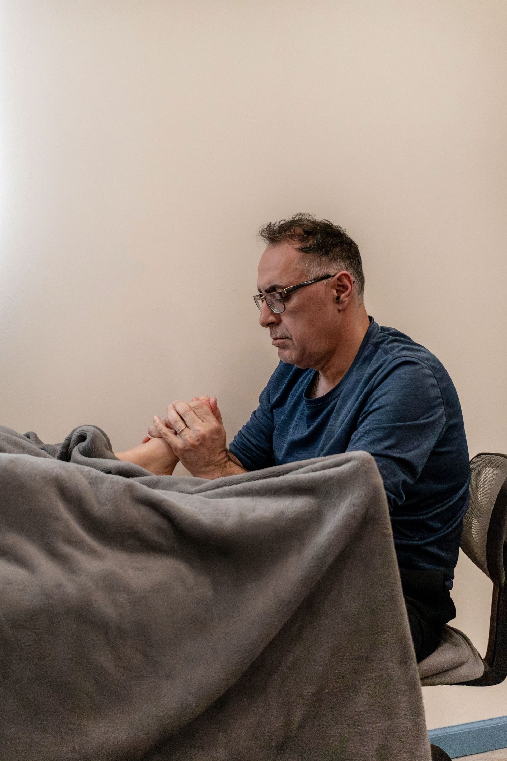 A Woman Is Giving A Foot Massage To A Man — Nicholson, PA — Optimal Whole Health & Nutrition