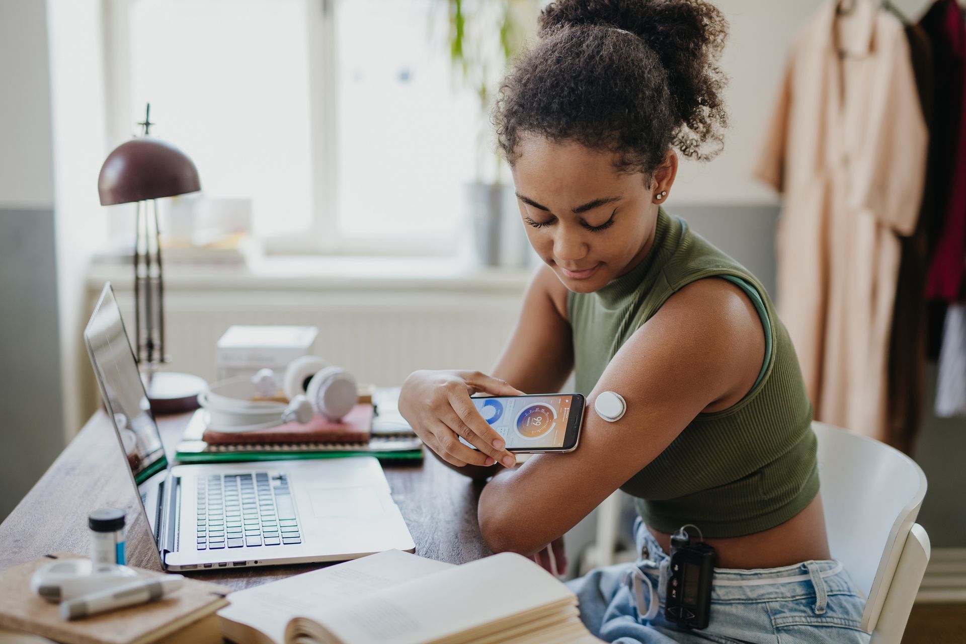 A Woman With Diabetes Is Sitting At A Desk  — Nicholson, PA — Optimal Whole Health & Nutrition