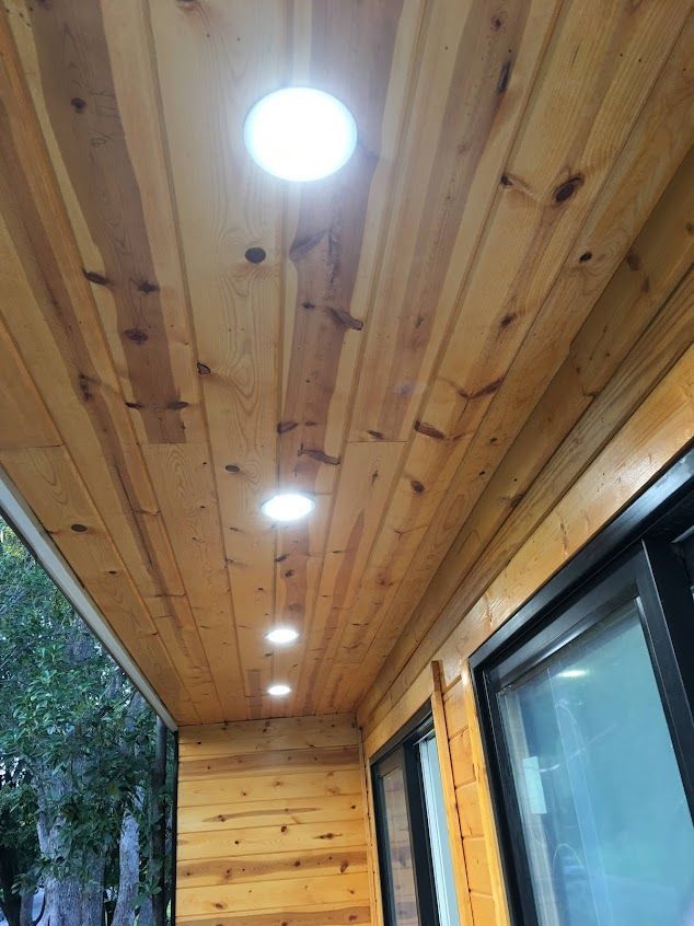 Mend Electric LLC - A wooden ceiling with a lot of lights on it