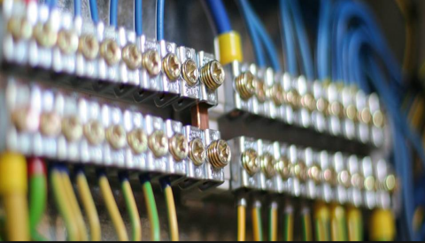 Mend Electric LLC - A close up of a bunch of wires connected to each other.