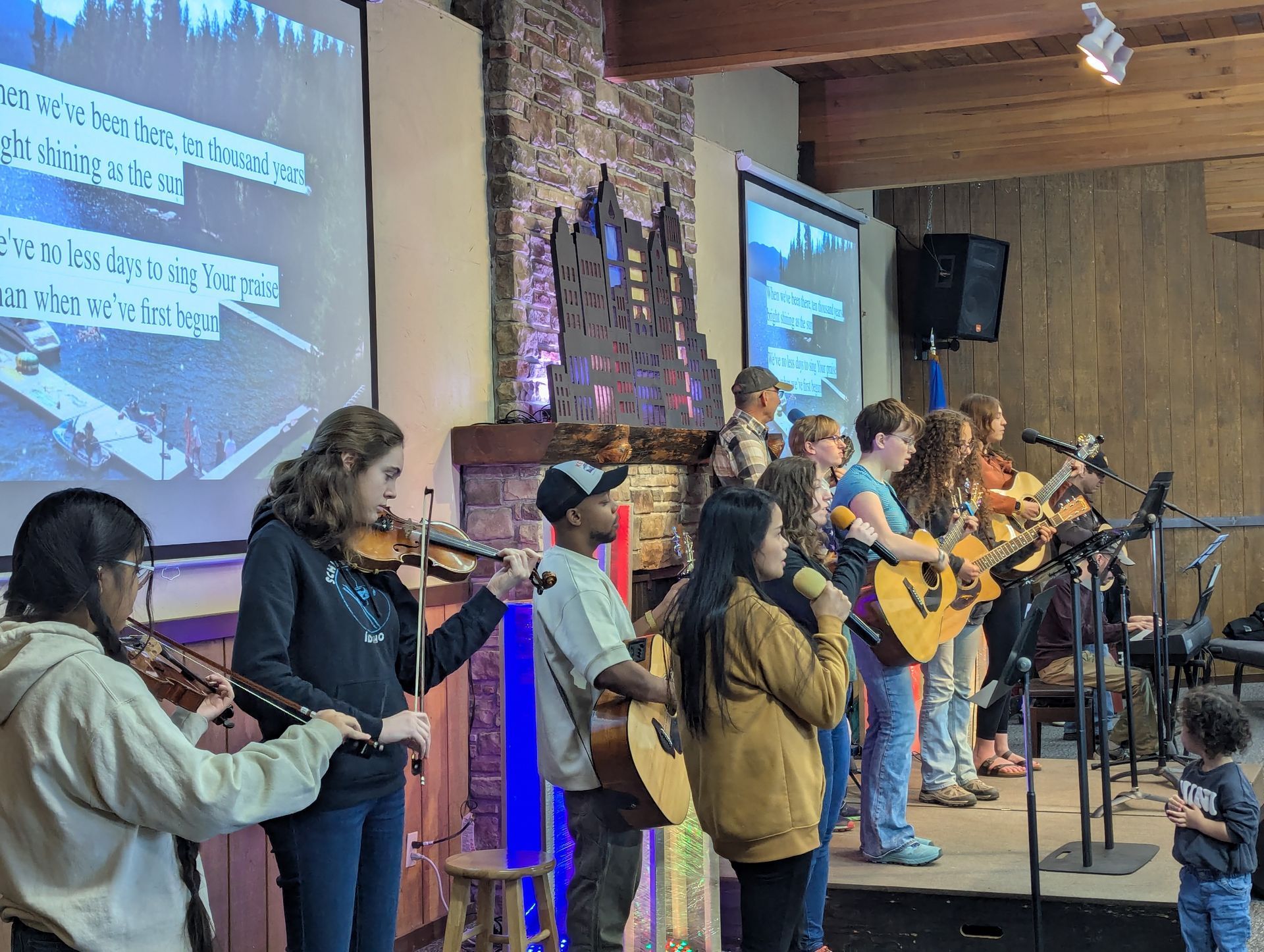 Pathfinders actively participate in worship, playing instruments and leading praise songs.